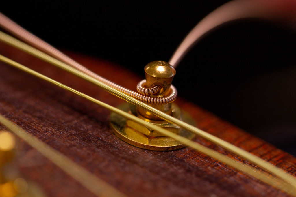 How To Change Guitar Strings Guide Yousician